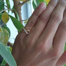 Изображение кольцо латуневое с золотым покрытием знак бесконечность spikes KL-000241